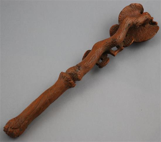 A Chinese wood ruyi sceptre, 35cm